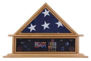 Shadow box frame with American flag and medals